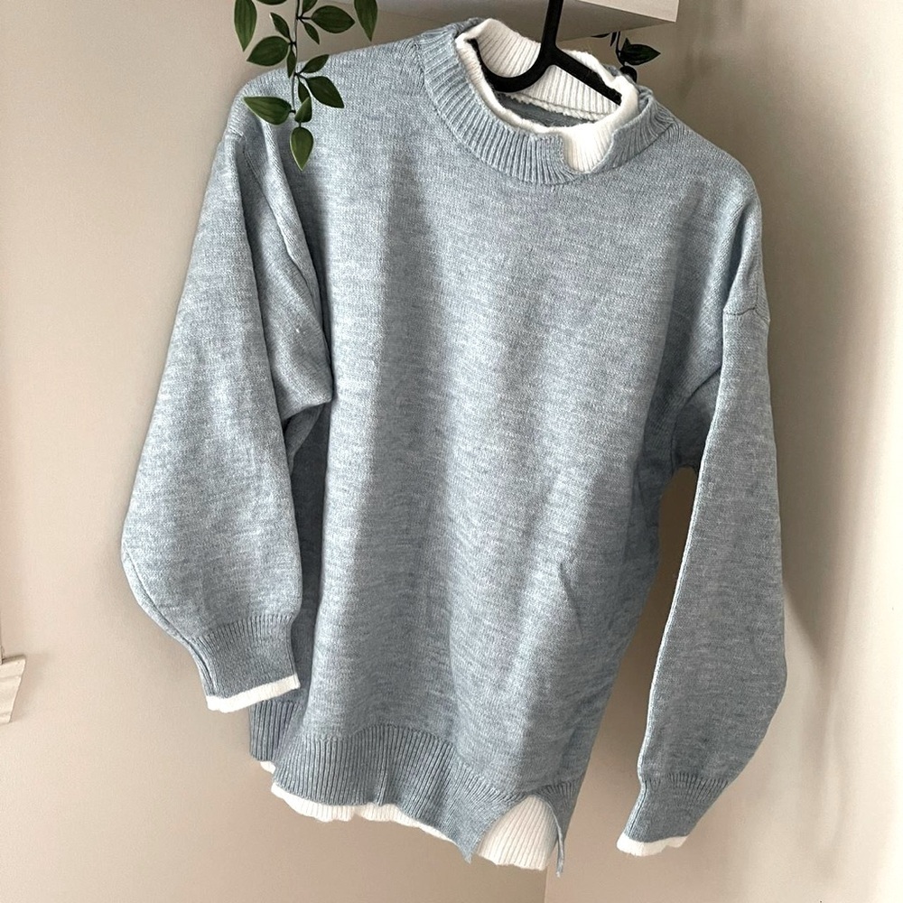 Light blue mock neck knitted sweater